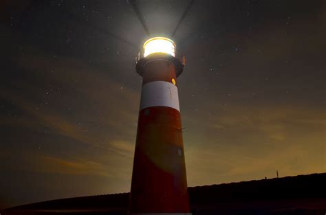 Free Images Coast Ocean Light Lighthouse Night Dusk Evening