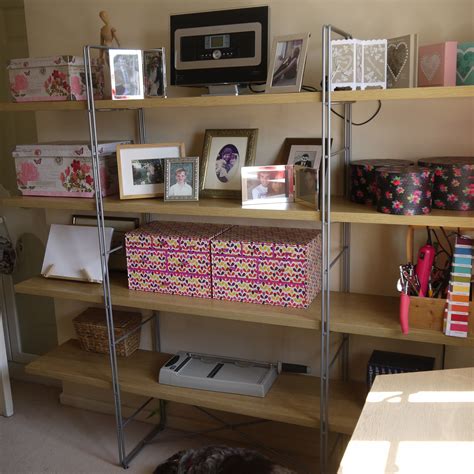 Large long double work tables for wiring projects and area for supplies with direct over head lights. Decorative shelving and storage | Decorative shelving ...