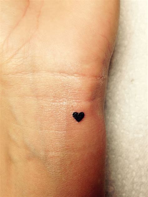 Small Black Heart Tattoo On Finger