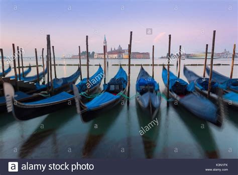 Venice Italy The Gondolas Swaying Rocked By The Sea In The Grand