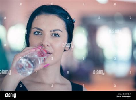 Fitness Woman Drinking Water From Bottle Stock Photo Alamy