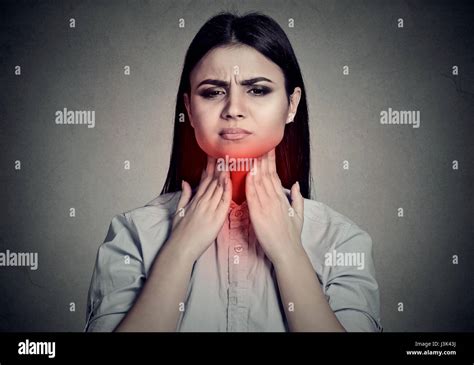 Woman With Sore Throat Touching Her Neck Colored In Red Isolated On