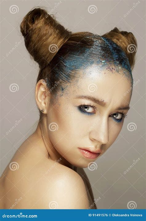 Portrait Of Beautiful Woman With Blue Make Up On Eyes And Blue G Stock