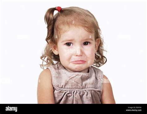 Portrait Of Sad Crying Baby Girl On White Stock Photo Alamy