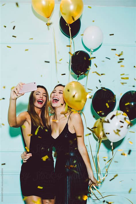 Beautiful Women Taking A Selfie In A New Year Party Celebration By