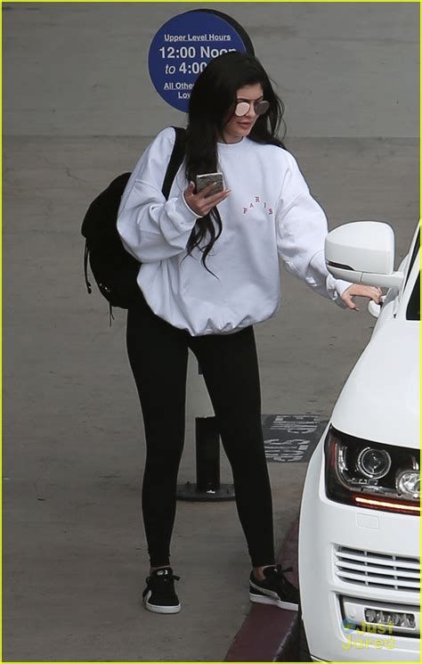 kylie jenner gets a big kiss from tyga at the airport photo 994509 photo gallery just
