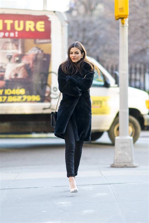 Victoria Justice Wears A Black Fur Coat With Matching Skinny Jeans And
