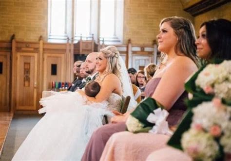 Beautiful Photo Of Bride Breastfeeding During Her Wedding Ceremony Goes Viral