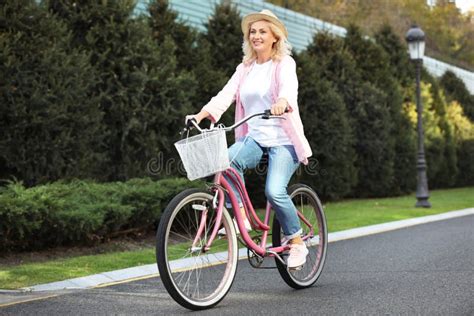 Mature Woman Riding Bicycle Active Lifestyle Stock Photo Image Of Riding Adult