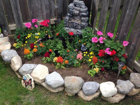 Easy Corner Flower Bed With Stone Retaining Wall Corner Flower Bed
