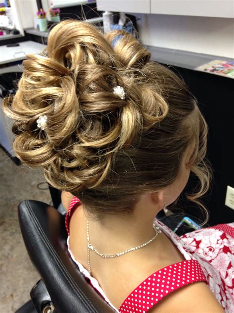 Special Occasion Updo Underneath French Braid With Pinned Barrel Curls