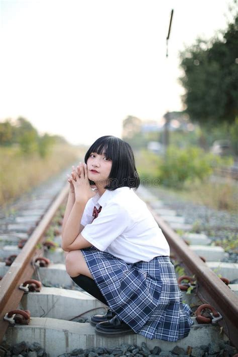 Asian School Girl Sitting In Railway Countryside Stock Image Image Of
