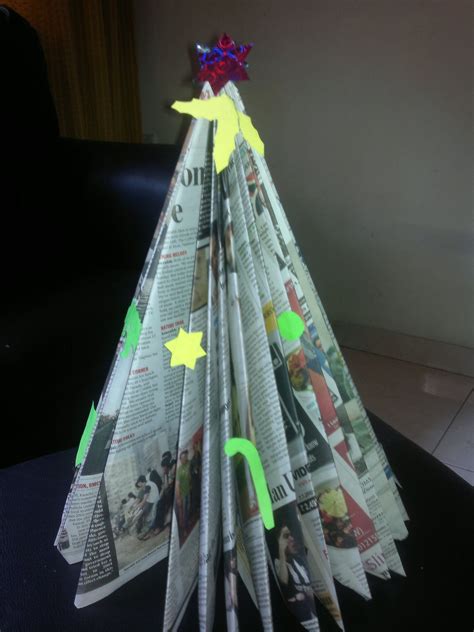 Make A Christmas Tree Out Of Old Newspapers And Magazines Add Paper