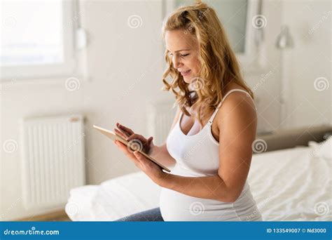 Pregnant Woman Relaxing And Using Tablet Stock Image Image Of Female Domestic 133549007
