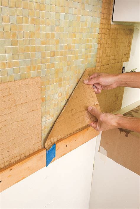 One advantage of mosaics is that the small individual tiles can often fit around obstacles without being cut. How to Install a Glass Mosaic Tile Backsplash in 2020 ...