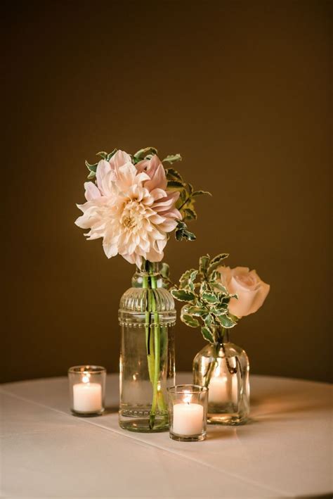 Blush pink flowers in small vase. Vintage clear glass bud vases with blush dahlias, roses ...