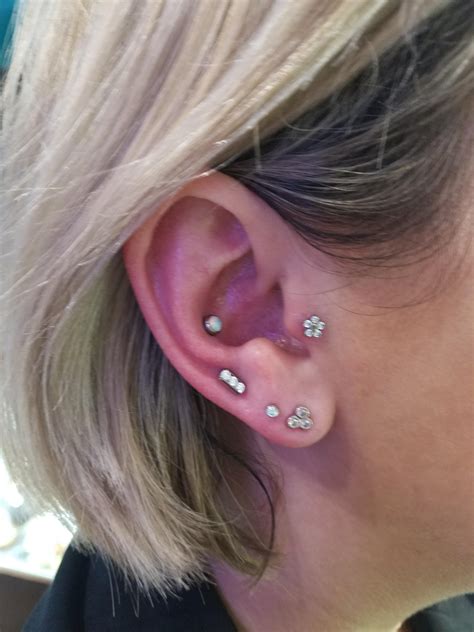 Finished my right ear with a high lobe and a conch piercing last night ...