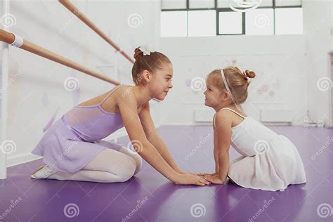 Charming Two Young Ballerinas Practicing At Ballet Class Stock Image