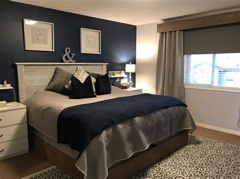 A small master bedroom doesn't have to be a problem. Navy Blue feature wall, Master bedroom makeover and loving ...