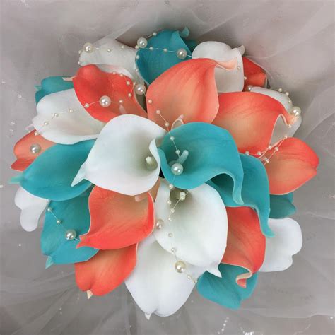 The natural real turquoise from around the world is the second most valuable turquoise, material from china, mongolia, mexico, persia, south america, and tibet. Lily Garden Real Touch Calla Lily Coral and White and ...