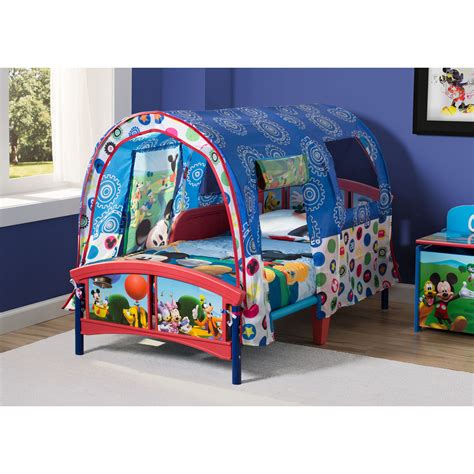 Designed in frosty shades of blue and purple, this sturdy kids' bed, topped with a sheer organza canopy, will cause a flurry of excitement. Delta Children Disney Mickey Mouse Toddler Tent Bed ...