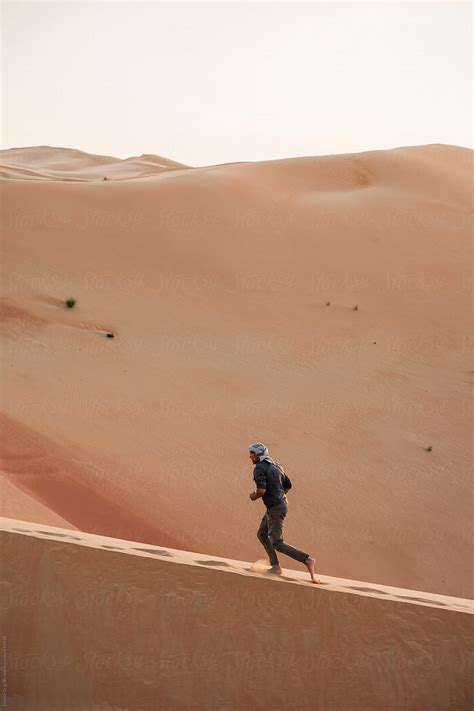 Man Exploring The Desert Del Colaborador De Stocksy Mauro Grigollo