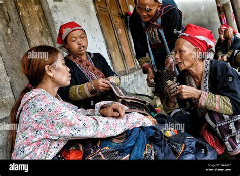 Ta Phin Vietnam August 24 Red Dao Women Sewing In The Village On