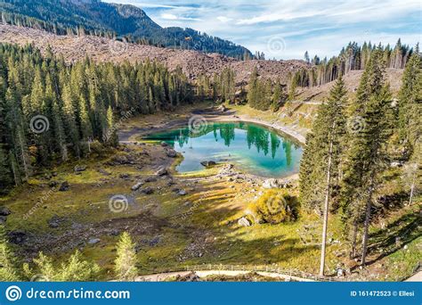 Aerial View Of A Small Alpine Lake Carezza O Karersee Located In The