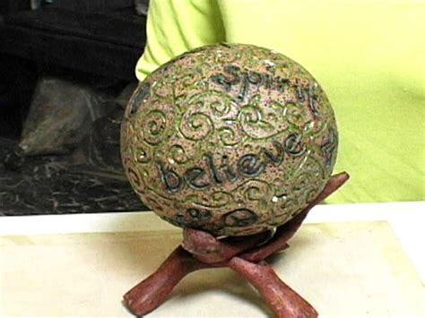 Gnomes by wil huygen our featured book. How to Make a Clay Garden Sphere | HGTV