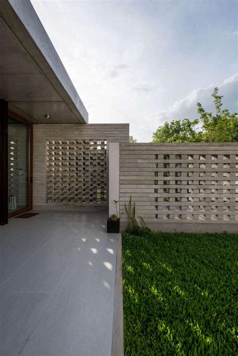 Unique Concrete Walls Act As A Privacy Fence And Allow The Breeze To