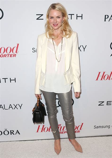 Naomi Watts Goes For A Casual Look Of Silver Trousers And White Blouse