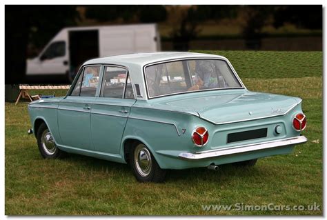 The village sits in a. Simon Cars - Ford Cortina