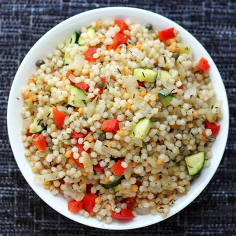 Tabbouleh made with whole wheat couscous instead of the traditional bulgur is a new twist for this refreshing salad. Cookistry: Whole Foods Feasting: Israeli Couscous Pilaf