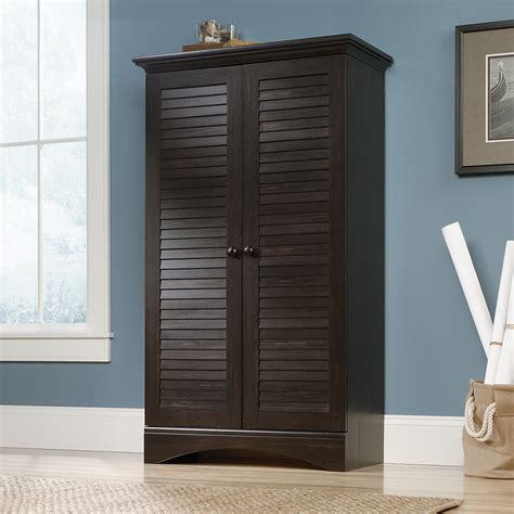 Combine the wall cabinet with other estate storage cabinets to create a custom solution. Sauder Harbor View Storage Cabinet