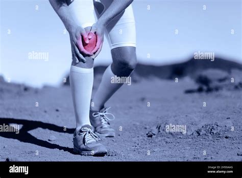 Knee Pain Athlete Sports Injury Runner Man Running On Trail Race With