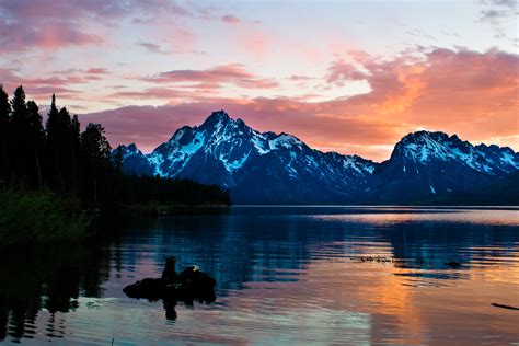 Free Photo Photography Of Mountains During Dusk Calm Waters