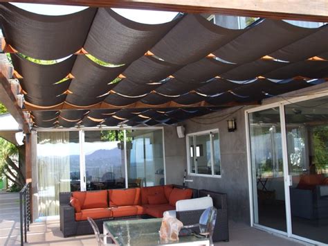 You can also place wooden poles or branches in buckets of sand, or make a few permanent poles set in concrete to hang these outdoor. Slidewire Outdoor Roman Shades - Modern - Patio - Los ...