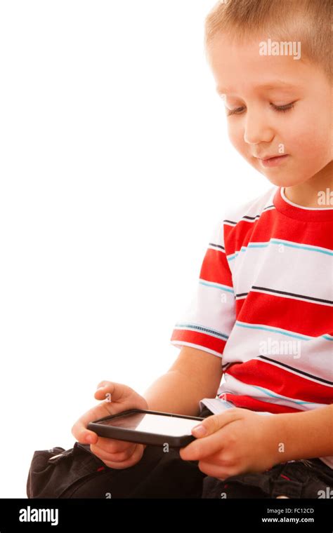 Little Boy Playing Games On Smartphone Stock Photo Alamy