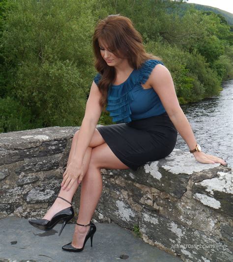 Stilettogirl Penny A Sexy Gal Posing Next To River In Her