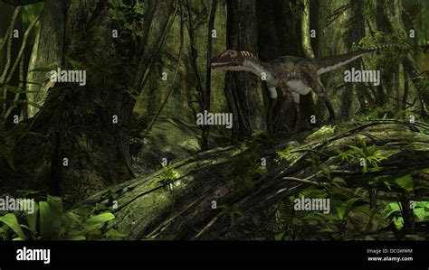 Utahraptor In A Prehistoric Forest Stock Photo Alamy