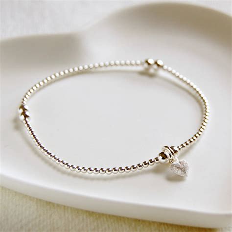 Sterling Silver Bead Bracelet With Heart Charm By The Carriage Trade