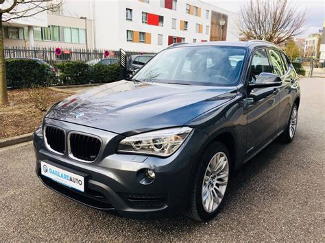 Its eagerness for action is shown above all in its athletic design. BMW X1 1.8d xDrive Sport Line vendu et importé par Gaillard Auto - 1562