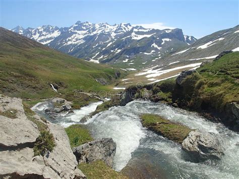 High Mountains Of The Pyrenees With Meadows Still Snowed In Summer And