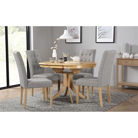 Hudson Round Oak Extending Dining Table With 4 Regent Light Grey Fabric Chairs By Furniture And