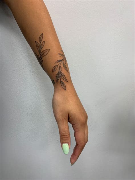 Wrap Around Leaf Tattoo Wrap Around Wrist Tattoos Simple Arm Tattoos