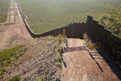 Aerialstock Aerial Photograph Of The Wall Border Fence Between Mexico