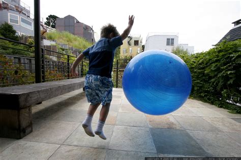 Boy Bouncing A Big Blue Ball Mg Used Here Here H Flickr