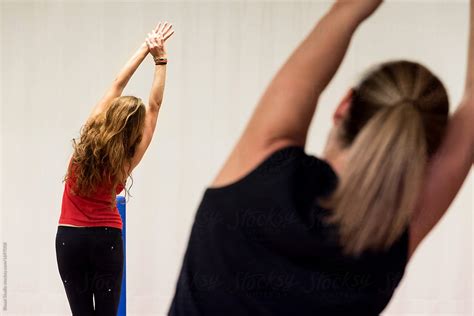 Senior Women Stretching In The Gym By Stocksy Contributor Bisual