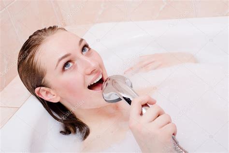 Singing Spa Closeup Picture Of Charming Blonde Babe Woman Relaxing In Bath With Foam Having