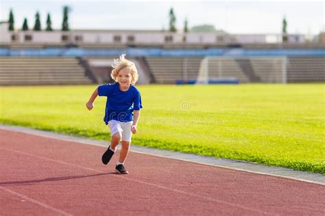 Child Running In Stadium Kids Run Healthy Sport Stock Photo Image